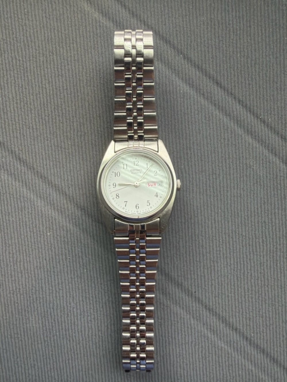 Seiko Silver Watch with White Dial